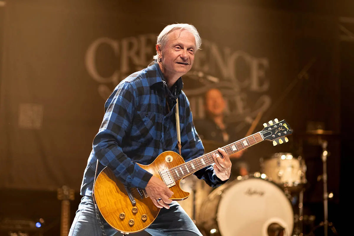Lead guitarist in the spotlight on stage